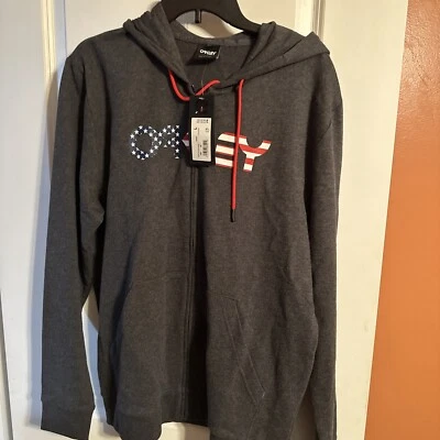 Sudadera Oakley Para Hombre L Gris Bandera Americana Sudadera con Capucha Estrellas Rayas Spellout Foto 1 de 4