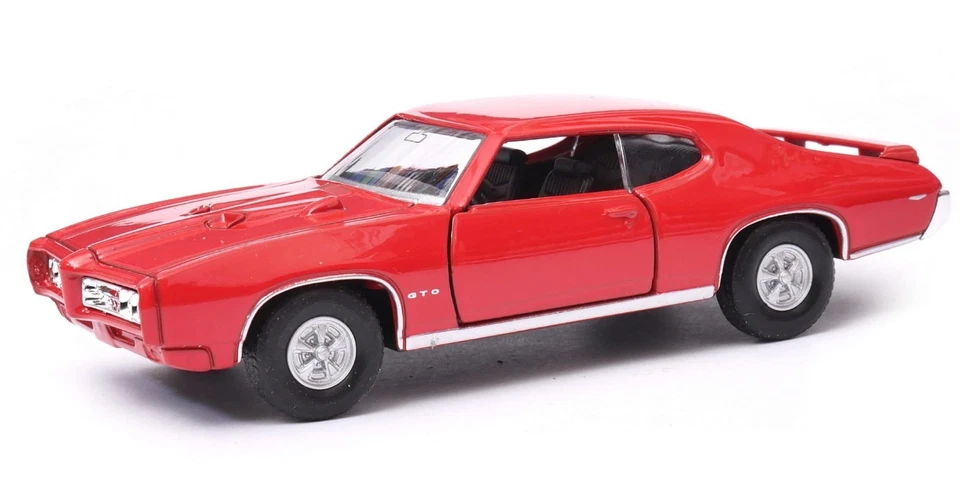 Welly 1969 Pontiac GTO arancione scala 1:34 1:39 auto pressofusa 4,5... - Immagine 1 di 4