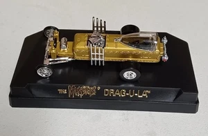 Johnny Lightning 1:43 Magmas THE MUNSTERS DRAG-U-LA Car Hot Hod - Picture 1 of 16