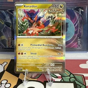 Koraidon 119/162 Gamestop Stamped Promo Cosmos Holo Pokemon TCG NM/MINT - Picture 1 of 2