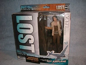 KATE Lost McFarlane 6" Figura Clips de Sonido con Base y Réplica Avión MISB 2006 - Imagen 1 de 2