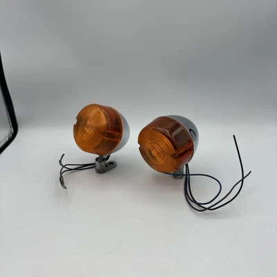 PAR DE LUCES INTERMITENTES DELANTERAS-TRASERAS OEM HARLEY DAVIDSON P21W CARCASA CROMADA + LENTE Foto 1 de 4