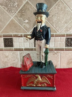 ANTIQUE UNCLE SAM CAST IRON MECHANICAL COIN BANK (The Book Of Knowledge) - works - Image 1 of 4