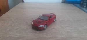 Aston Martin V12 Vantage (1/64) Brown/Black - Welly - No52303 - Imagen 1 de 7