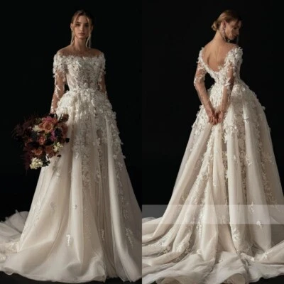Luxury A-Line Wedding Dresses Boat Neck Long Sleeved Lace 3D Floral Bridal Gowns - Image 1 of 4