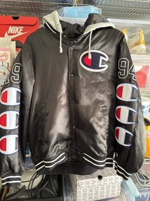 Chaqueta Universitaria Supreme Champion Con Capucha Satén - Talla M - Negra Foto 1 de 3