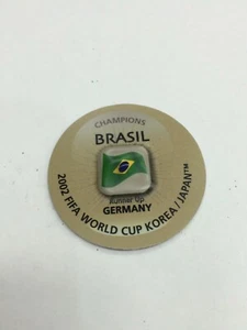 2010 FIFA south Africa World Cup Soccer EMBOSSED Magnet Tazos 2002 CHAMP BRASIL - Picture 1 of 3