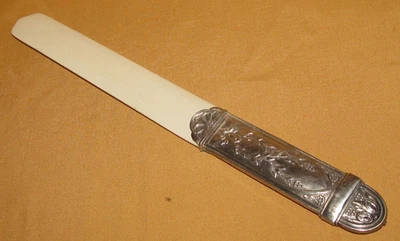 Ancien ouvre lettre coupe papier en argent poinçon minerve décor Empire - Photo 1/4