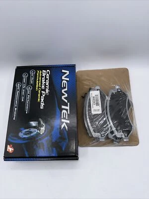 Pastilla de freno de disco de cerámica delantera Newtek para Jeep Liberty Grand Caravan Town Country Foto 1 de 3