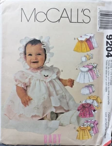 McCall's Sewing Pattern 9204 Babies NB-Sml-Med Dress Apron Panties and Bonnet - Picture 1 of 8