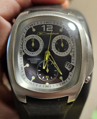 RARO RELOJ PARA HOMBRES Reebok INDIGLO POWERED BY Timex esfera negra acero inoxidable WR50M Foto 1 de 4