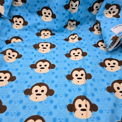 Acolchado de costura de tela azul/marrón de franela con caras de mono 42" de ancho 2 yardas Foto 1 de 4