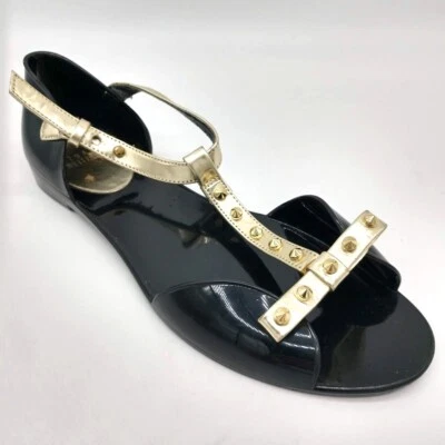Stuart Weitzman Sz 6.5 Nifty Black Jelly Gold Studded T-Strap Flat Sandals Shoes - Image 1 of 4