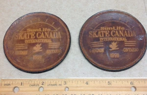 2 Vintage Leather Coasters Sun Life Ice Skate Canada International 1991 3-1/4" - Picture 1 of 5