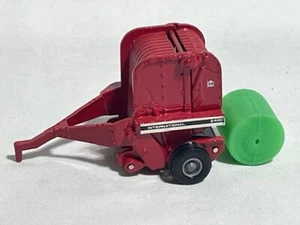 ERTL IH International 2400 Round Hay Baler w/ Bale, Gray Rims, 1/64 - Picture 1 of 2