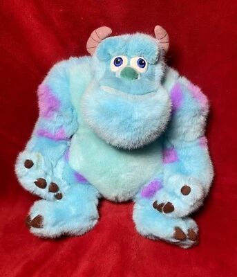 Peluche azul abrazable de 12"" Disney Store Sully Sullivan Monsters Inc. Foto 1 de 4