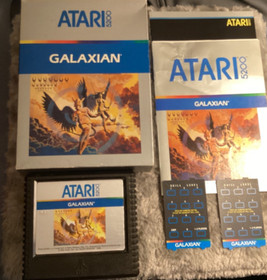 Mint condition cartridge of Galaxian Atari 5200 1981 complete with overlays