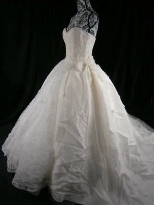 Vestido de novia Edgardo Bonilla Kleinfeld 10 marfil encaje sin tirantes Foto 1 de 4