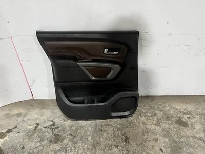 2017-2018 Nissan Titan Black/Brown Leather Left Rear Door Panel Trim Color: P - Image 1 of 4