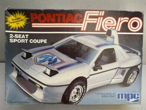 MPC Pontiac Fiero 2-Seat Sport Coupe Scale 1:25 Model Kit 6309 ETRL - Picture 1 of 16