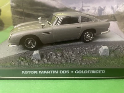 MODELLINO AUTO ASTON MARTIN DB5 007 JAMES BOND 1965 GRIGIO - SCALA 1:43 - Immagine 1 di 4