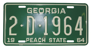 1964 reproduction Georgia license plate, green with embossed peach letters.