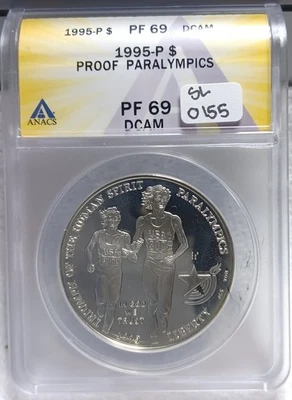 1995-P $1 Paralympics Silver Dollar Commemerative Proof 69 DCAM ANACS. Vid SL155 - Image 1 of 2
