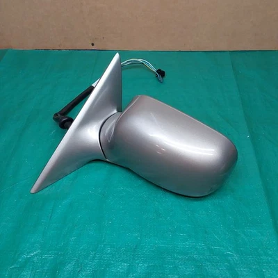 Espejo retrovisor izquierdo Cadillac Deville 2000-2005 con señal plateada OEM 25747312 Foto 1 de 4