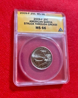 2009 P 25 CENTS AMERICAN SAMOA STRUCK THROUGH GREASE ANACS MS 66 MINT ERROR - Image 1 of 2