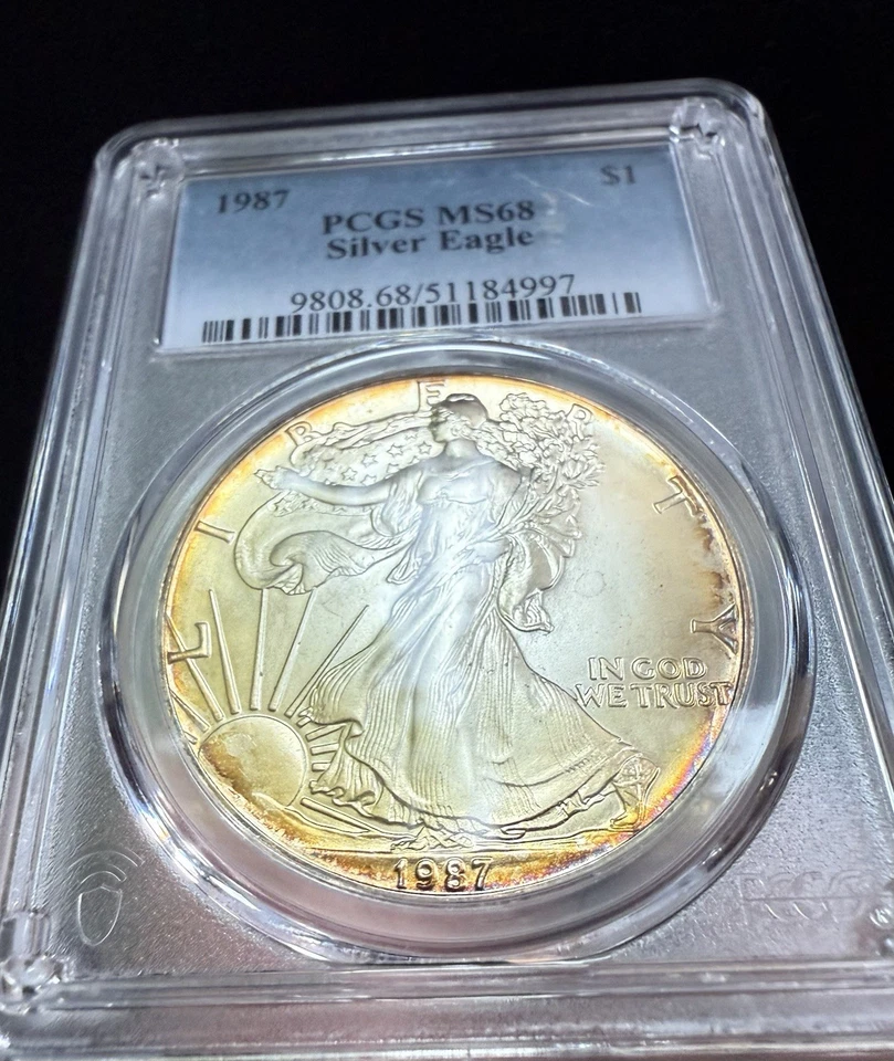 Rim Toned 1987 MS 68 American Silver Eagle PCGS Graded - Image 1 of 3