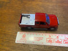 Unbranded red Mitsubishi 4x4 truck pick up