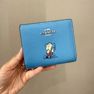 Cartera a presión Coach X Peanuts con Linus CBN91 - Imagen 1 de 8