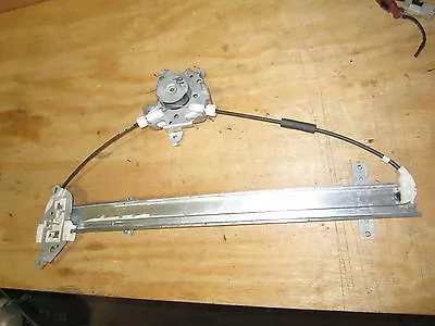 INFINITI QX4 NISSAN PATHFINDER 1997-2003 REGULADOR ELEVALUNAS DERECHO DELANTERO O TRASERO Foto 1 de 4