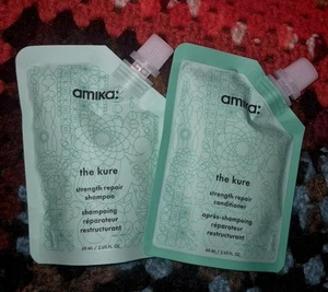 NUOVO SIGILLATO Amika The Kure Intense Strength Repair Shampoo Balsamo 2 fl oz ea - Foto 1 di 1