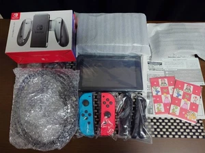 Nintendo Switch Console with Joy-Con Charging Grip Clean - Picture 1 of 3