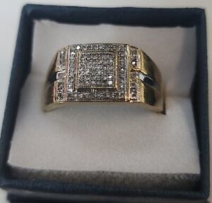 MENS 10K gold, this ring features 1/4 ct. of micro-set diamonds