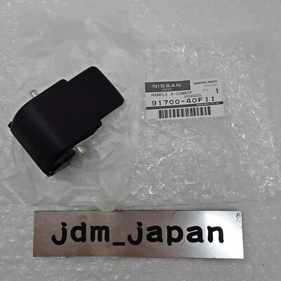 Manija de techo corredizo genuina nueva Japón Nissan 91700-40F11 240Sx Foto 1 de 4