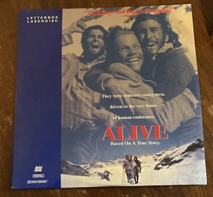 Alive - Laserdisc - Widescreen - RARE HTF - Excellent Condition - TESTED !! - Picture 1 of 3
