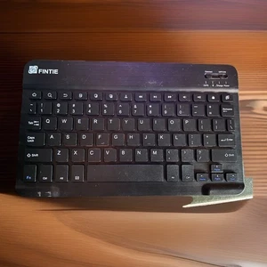 Teclado Bluetooth inalámbrico ultra delgado Fintie de 7 pulgadas para iPad iPhone Android - Imagen 1 de 1