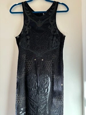 Vestidos para mujer Yoana Baraschi sin mangas con cuentas y flecos color negro talla 4 Foto 1 de 4