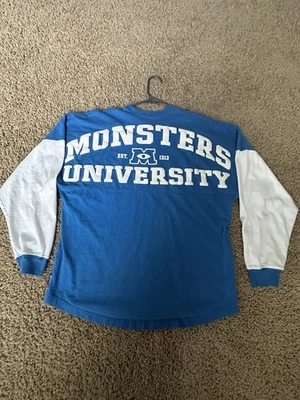Camiseta deportiva Monsters University Spirit de los parques de Disney Monsters Inc. Foto 1 de 3