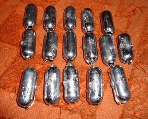CASTING NET CAST NET LEAD WEIGHTS 1.5 OZ 1 3/8 LONG X 1/2 WIDE WITH 1/4 HOLE - Picture 1 of 3