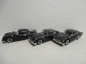 Johnny Lightning LOOSE 1964 ASTON MARTIN Black '64 HARD TIRE Variation x3 - Picture 1 of 3