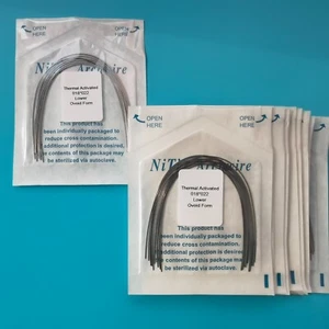 Paquetes de 20 cables de arco de ortodoncia dental activados térmicamente Niti rectangulares - Imagen 1 de 5