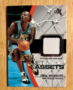 Tarjeta deportiva Fleer EX 2003-04 baloncesto Jamal Mashburn Net Assets - Imagen 1 de 2