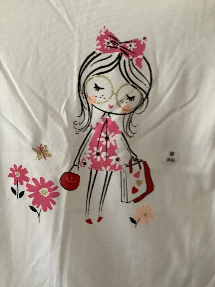 CAMISETA NIÑA BLANCA PIEL DURA NIÑA CON VESTIDO ROSA Y LAZO M 5/6 NUEVA CON ETIQUETAS Foto 1 de 2