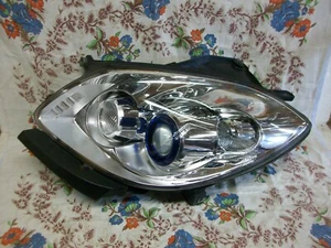 BUICK Enclave bis 2011 Bi Xenon Scheinwerfer mit Kurvenlicht links - Bild 1 von 9