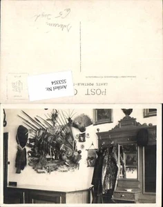 553354,tolle Foto-AK Jagd Jäger Kasten Trophäen Vogel Hut pfeil Bogen Interieur - Bild 1 von 1