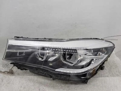 2016-2019 BMW 750i LEFT Headlamp w/o halo design; L. OEM - Image 1 of 4