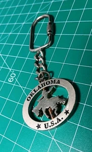 Vintage OKLAHOMA U. S.A. KEY chain RODEO Spinner - Picture 1 of 6